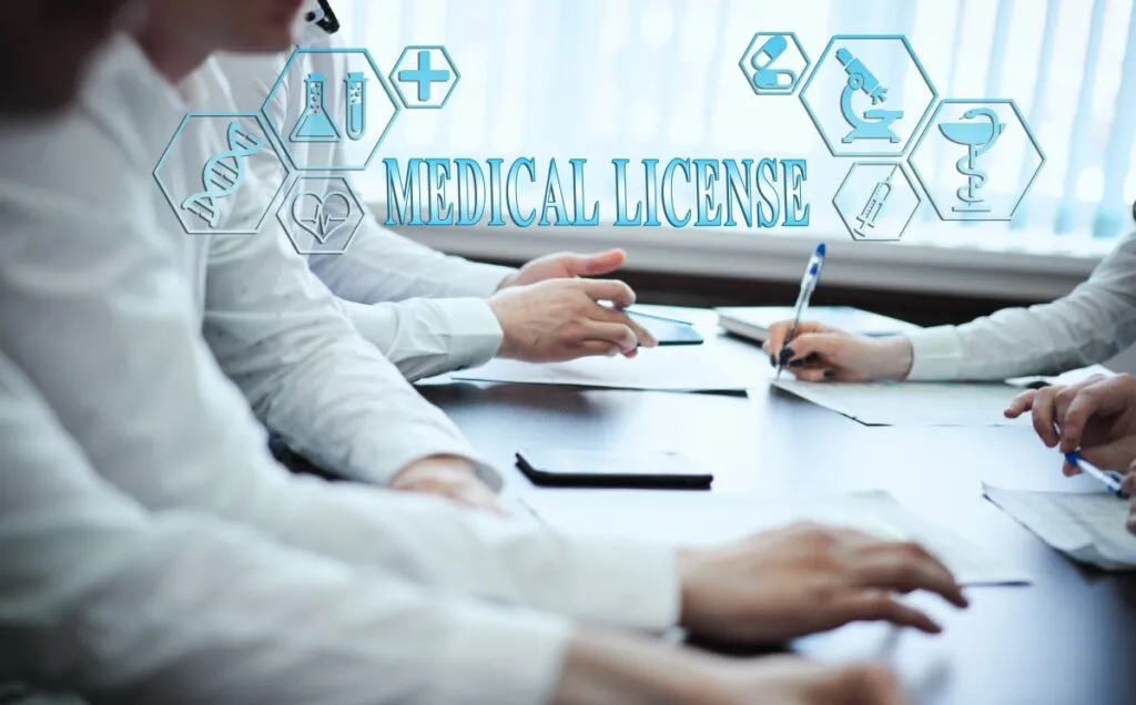 Professionals collaborating in a meeting with medical licensing icons.